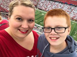 Vindy Tullis and her son Luke Tullis at the game.jpg